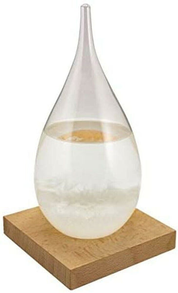 Sturmglas in Tropfenform auf Holz Höhe 21 cm