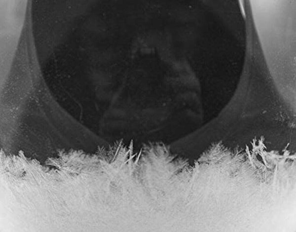 Sturmglas in Tropfenform auf Holz Höhe 21 cm