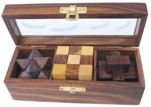 3 Knobelspiele - in dekorativer Holzbox mit Glasdeckel